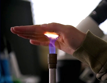 File:Hand to the flame.jpg