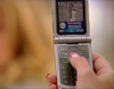 File:Meredith snaps a photo of Claire.jpg