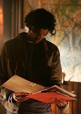 File:1x1-Mohinder with Files.jpg