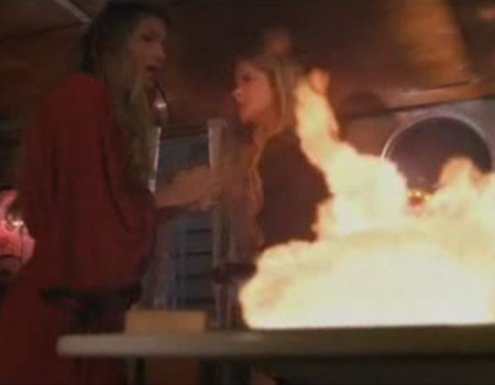 File:Powers Amanda pile of books.jpg