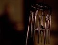 The wind chimes later alert Noah Bennet about the Haitian's presence.