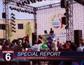 News footage shows a male and female hip hop dancer celebrating the summit.