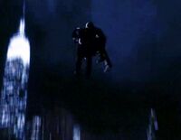 Peter flies, saving Claude.