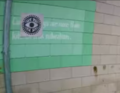 The HeroTruther eye appears on a poster on a wall in the parkour video.